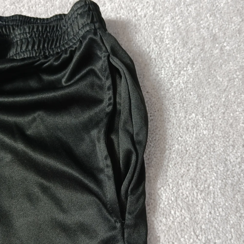 Kids Black Shorts with Green Paw Print